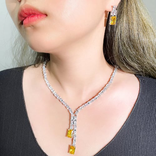 طقم زركون انيق قطعتين مزين بزركون اصفر