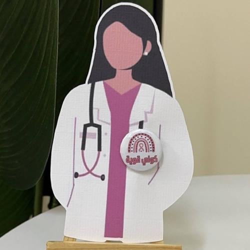 توزيعات التوعية من سرطان الثدي مع بروش بدبوس