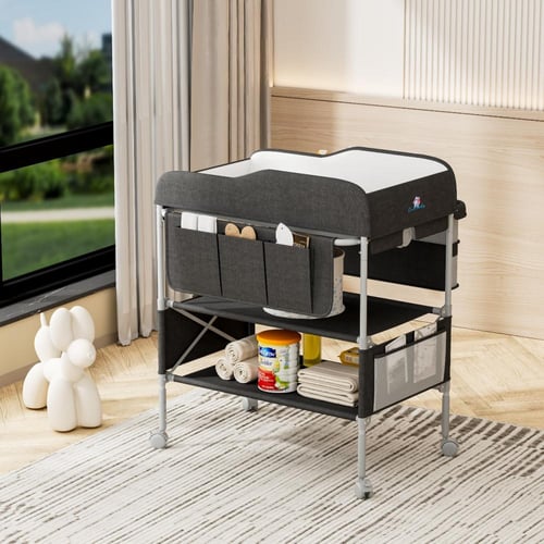 طاولة غيار ومنظم اغراض الطفل