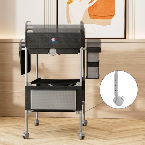 طاولة غيار ومنظم اغراض الطفل