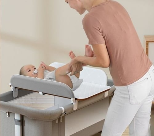 سرير نكست تومي رمادي مع طاولة تغيير