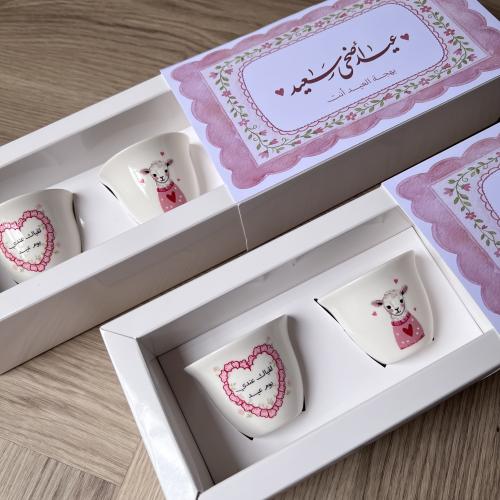 Box of party favors with two cups
