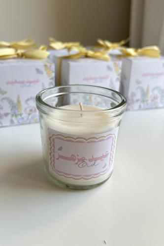 A scented candle with box