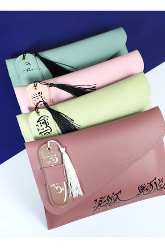 Leather pouch with the phrase "Blessed Ramadan" wi...