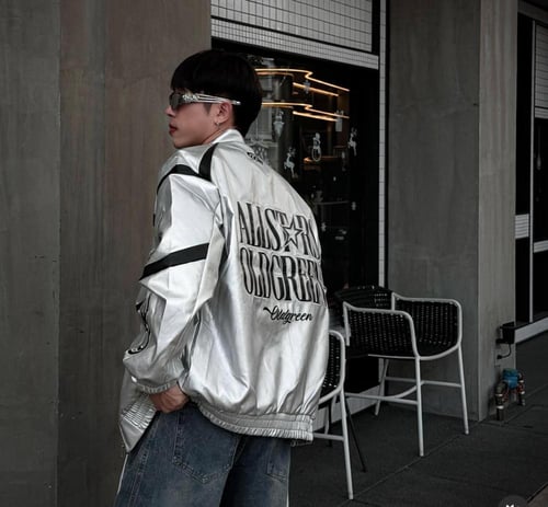 Hellstar's red bomber jacket is decorated with a b...