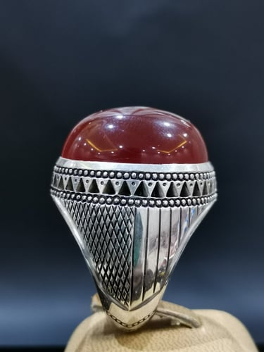 خاتم الفضة بحجر عقيق خرساني ايراني أحمر بصياغة الخ...