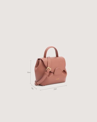 شنطة تناسب اطلالتك اليومية بلون وردي