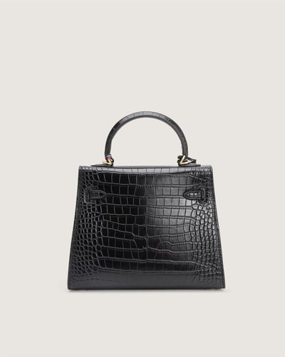 شنطة هدى النسائية جلد بلون أسود