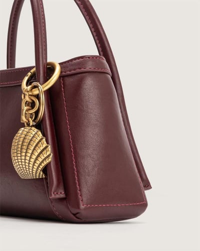 شنطة وسن النسائية من الجلد بلون عودي