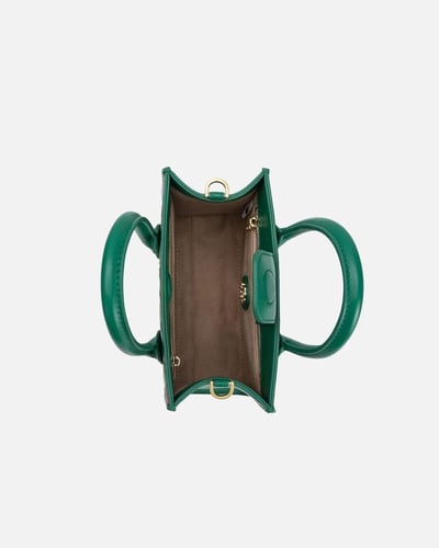 شنطة نسائية تعبر عن الفن بأناقة بلون أخضر