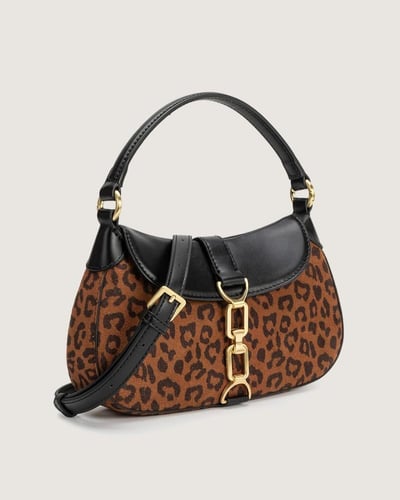 شنطة سَما النسائية بلون أسود مع نقشة جلد النمر