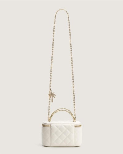 شنطة أمواج النسائية من الجلد بلون أبيض