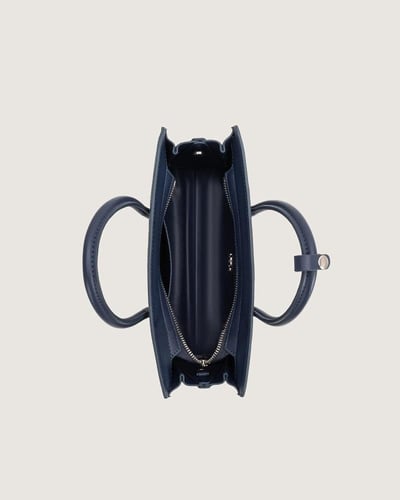 شنطة ورد النسائية جلد بلون أزرق