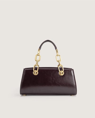 شنطة نمق النسائية من الجلد بلون أرجواني