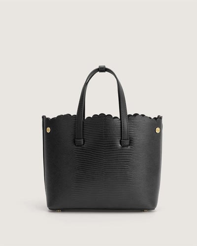 شنطة شذى النسائية جلد بلون أسود