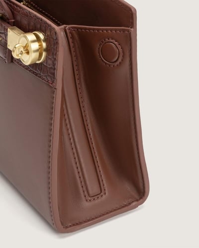 شنطة شمس النسائية جلد بلون بني