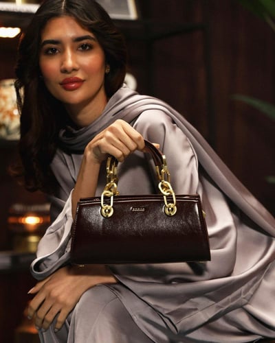 شنطة نمق النسائية من الجلد بلون بني