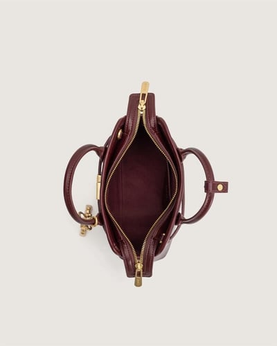 بوكس هدية شنطة سولار النسائية جلد بلون عودي