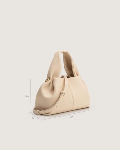 شنطة أمجاد النسائية جلد باللون البيج