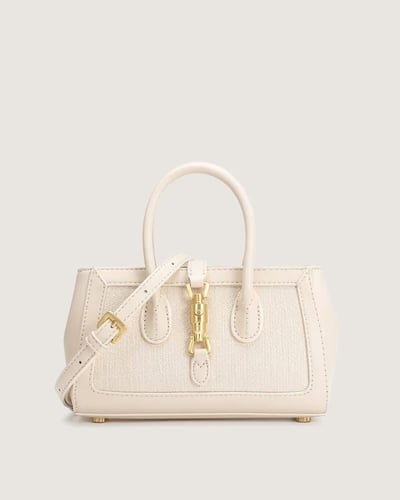 شنطة نسائية لإطلالتك العملية بلون بيج