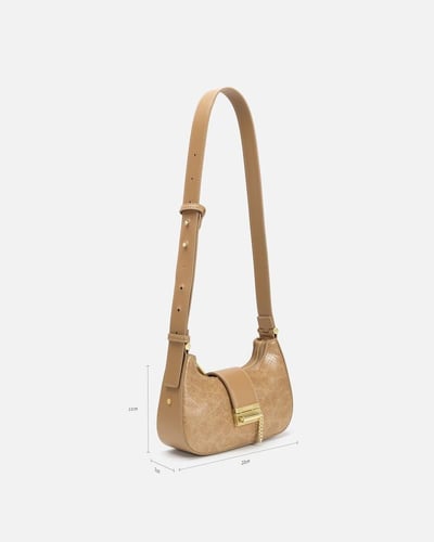 شنطة مِسك النسائية جلد بلون بيج