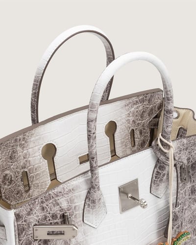 شنطة همس النسائية عملية بلون بيج وبني