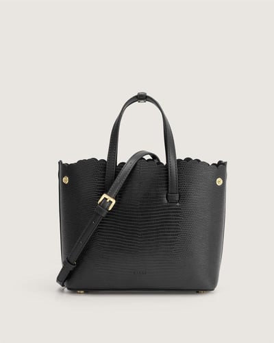 شنطة شذى النسائية جلد بلون أسود