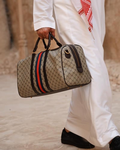 ‎ طقم شنطتين تناسب الجنسين من الجلد بلون بني