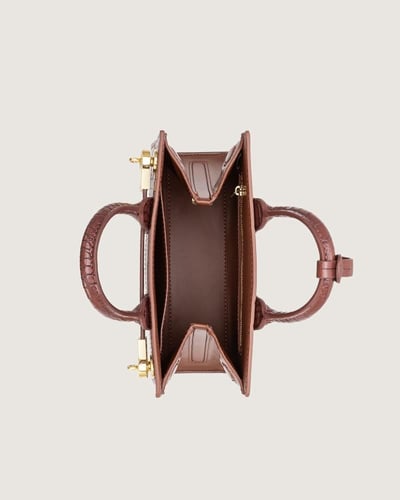 شنطة شمس النسائية جلد بلون بني