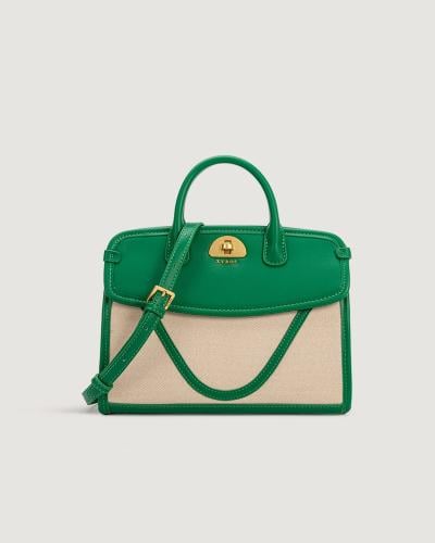 شنطة نُور النسائية بحجم واسع بلون أخضر.