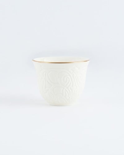 طقم فناجين قهوة وشاهي باللون الأبيض.