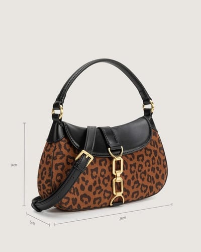 شنطة سَما النسائية بلون أسود مع نقشة جلد النمر