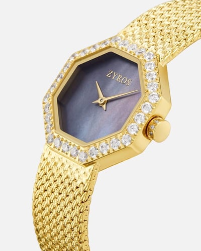 ‎ ساعة نسائية بسير شبكي بلون ذهبي