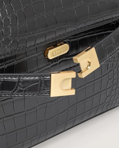 شنطة لمار النسائية بلون أخضر وأسود