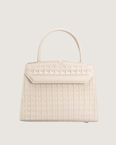 شنطة نسائية كلاسيك واسعة بلون بيج