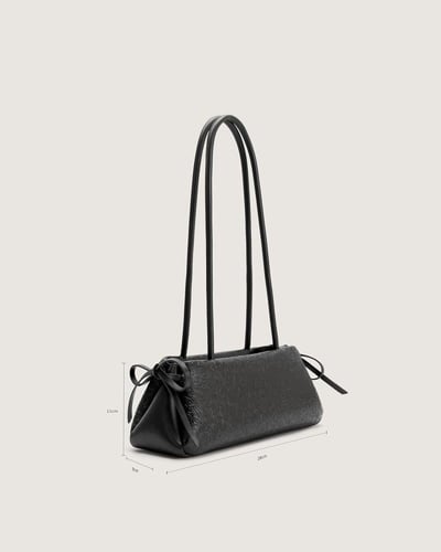 شنطة تعزز هويتك باللون الأسود