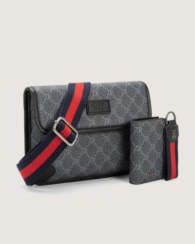 طقم هدية للجنسين من شنطة ومحفظة وميدالية.