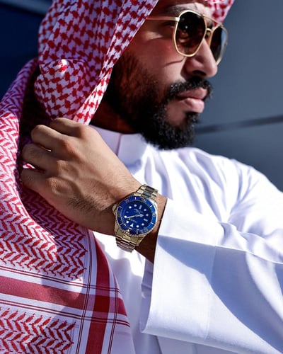 ساعة ديب اوشن الرجالية بلون ذهبي ملكي