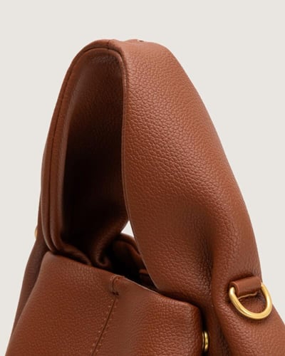 شنطة أمجاد النسائية جلد باللون البني