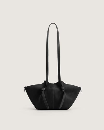 شنطة لفتة النسائية من المخمل بلون أسود