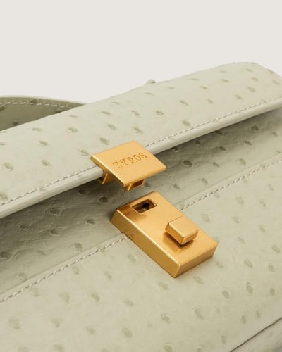 شنطة فخر النسائية بلون أخضر فاتح