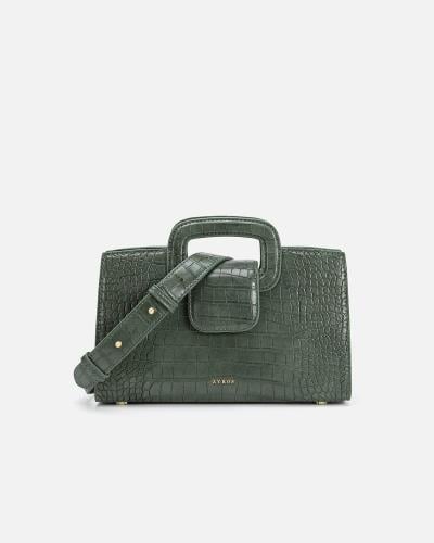 شنطة نسائية تعبر عن الأناقة بلون أخضر