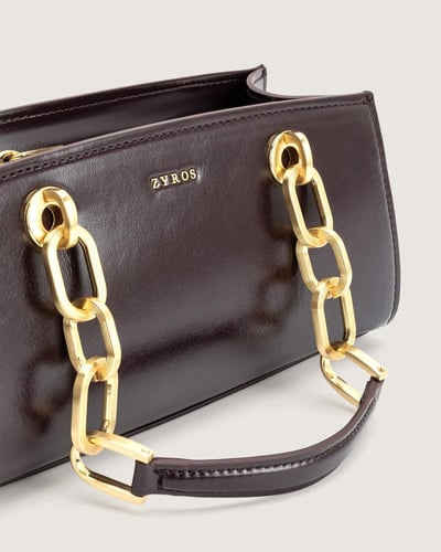 شنطة نمق النسائية من الجلد بلون أرجواني