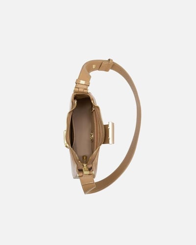 شنطة مِسك النسائية جلد بلون بيج