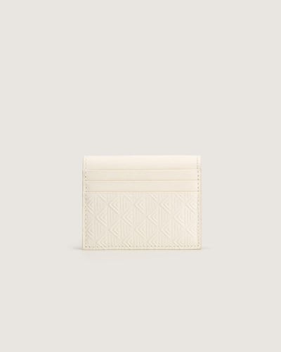 محفظة من الجلد المنقوش بلون أبيض