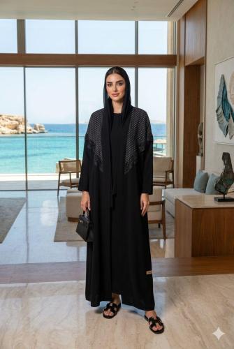 Elegant wide-cut royal abaya with polka dots from...