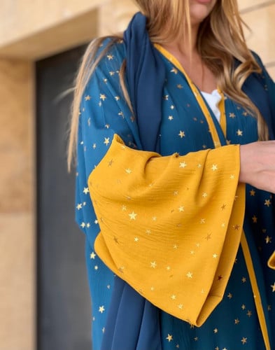 عباية صيفية باردة القماش كريب اخضر و الأكمام لون ك...