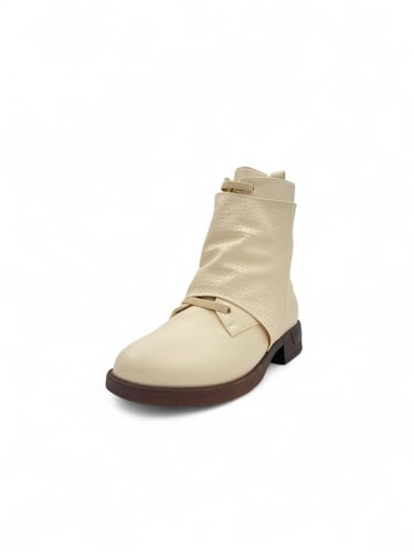 بوت جلد نسائي – بوت نسائي أنيق بتصميم راقي من متجر...