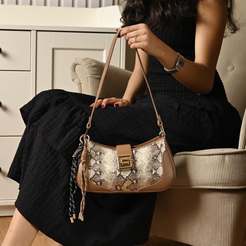 شنطة نسائي كاجول مصممة من سيرة