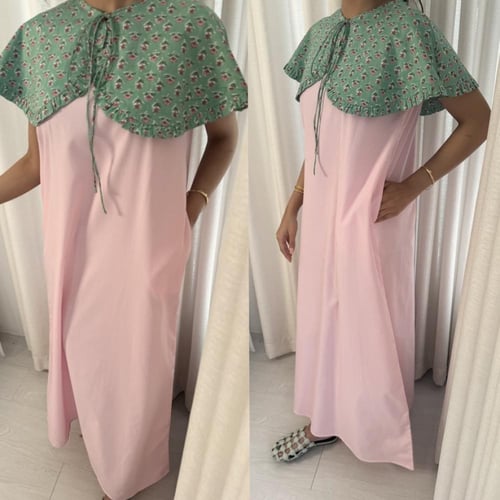 فستان وردي مخطط وياقة ورد خضراء